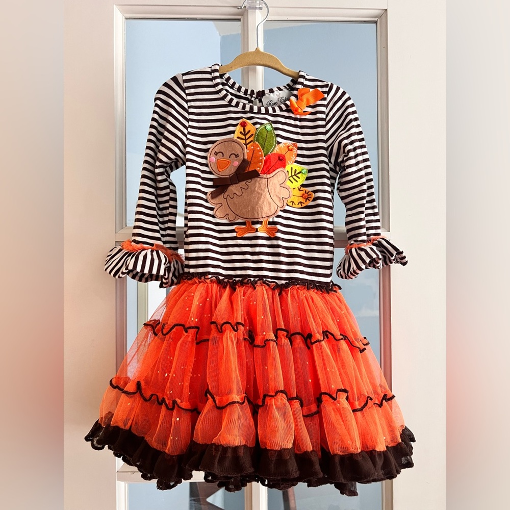 Super cute Thanksgiving dress! Love the little turkey on the front.